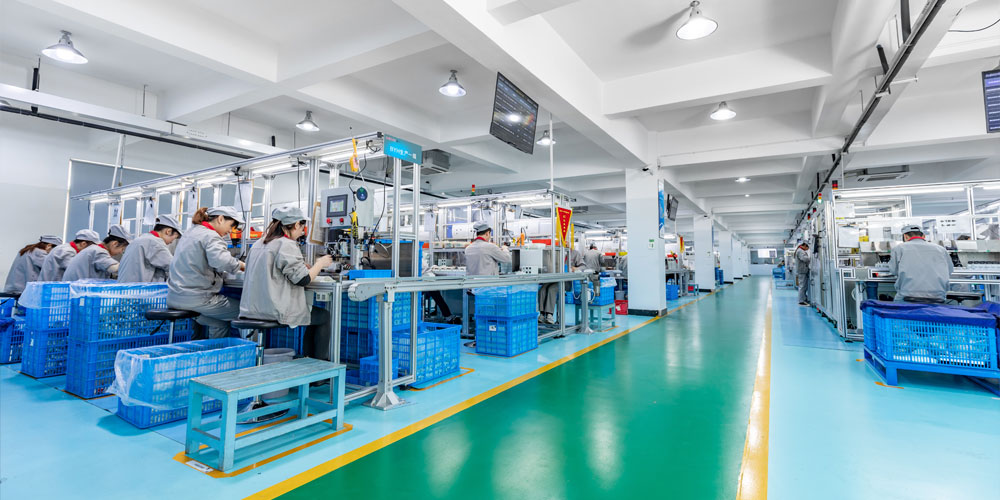 workers test the products in the dustfree workshop